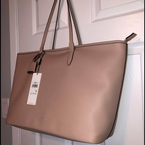 Calvin Klein Handbags - New never used Calvin Klein purse.